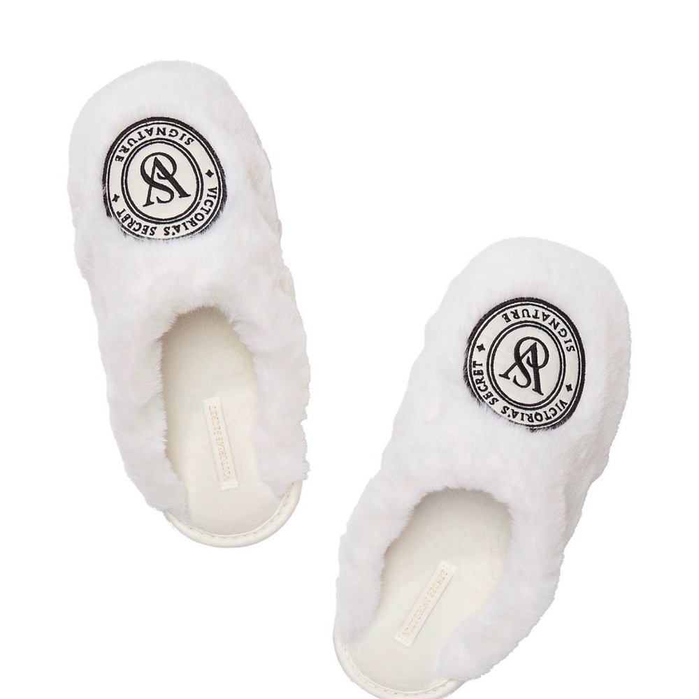 NWT Victoria's Secret White Faux Fur Fluffy Slippers. Very comfortable & warm.
